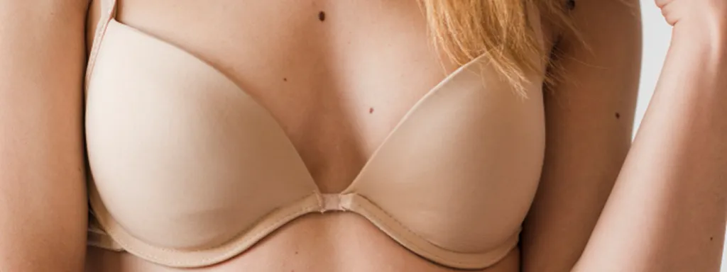 Шрамы после увеличения груди